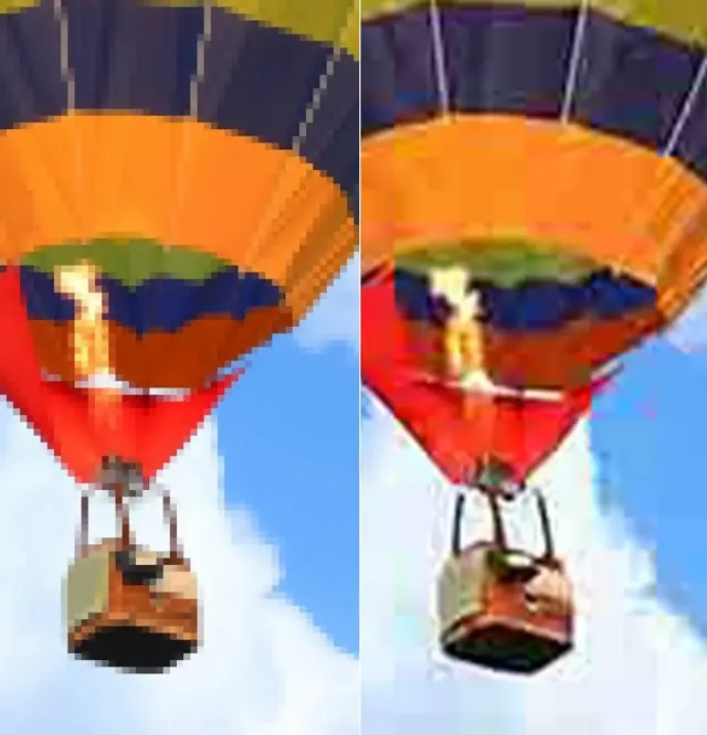  Une montgolfière colorée, avec une nacelle en osier suspendue en dessous.