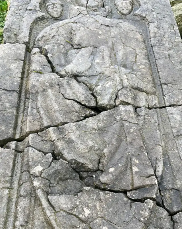An effigy depicting two knights guarding St Nick sits in the Jerpoint cemetery