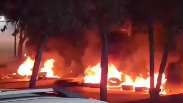 Kurdish rights group Hengaw posted video of what it said was a burning roadblock in the western city of Sanandaj