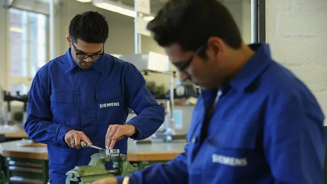 Беженцы на трудовом обучении в Германии