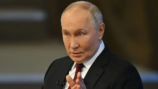 Путин
