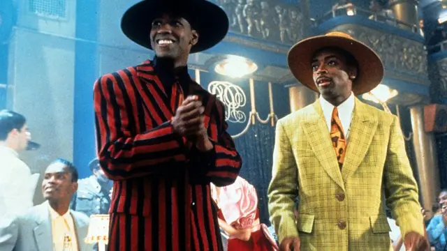 Дензел Вашингтон (Малкольм Икс, слева) и режиссер фильма Спайк Ли в роли Коротышки в фильме Ли "Малкольм Икс").