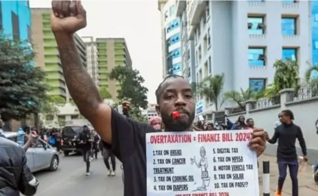 Protester with placard