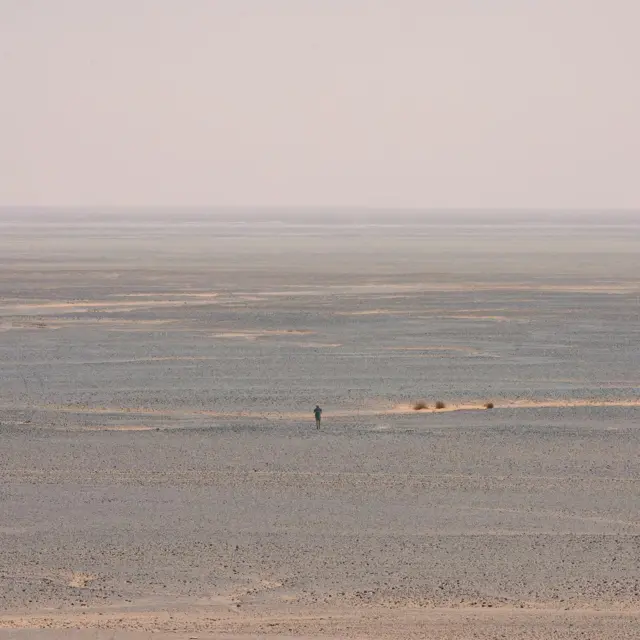 Russell Cook running in the Sahara Desert