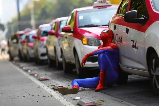 A person dressed up as Spider-Man