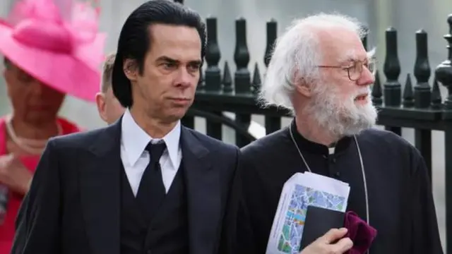 Nick Cave and Rowan Williams arrive togeda
