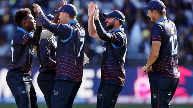 Ben Shikongo celebrates taking a wicket for Namibia against Sri Lanka