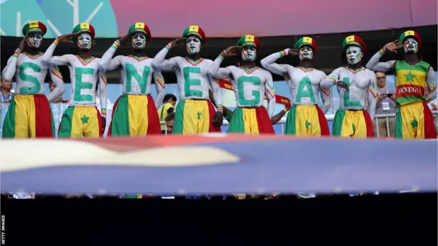Painted Senegal football fans