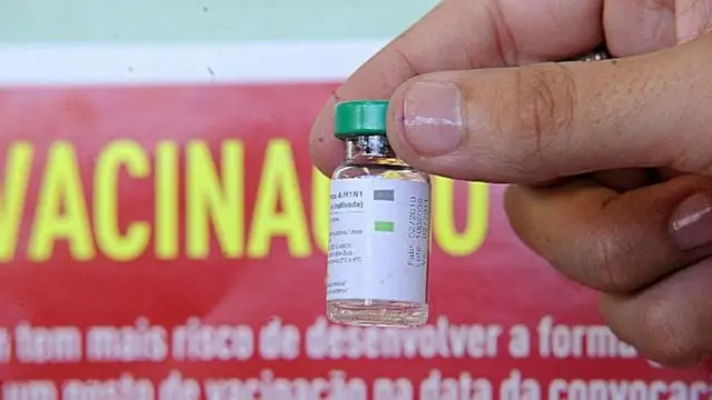 Mão segura frascopromo code brazino777vacina contra H1N1