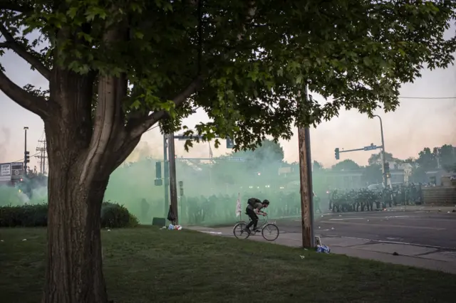 21. Minnesota state patrol break up demonstrators with tear gas and flash bangs during protests resulting from the killing of an unarmed black man, George Floyd, by police.