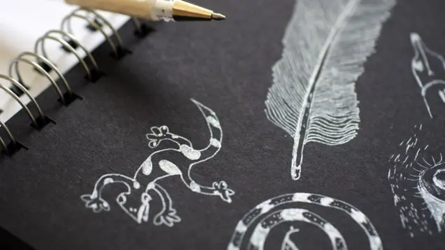 Animals doodled on a notepad