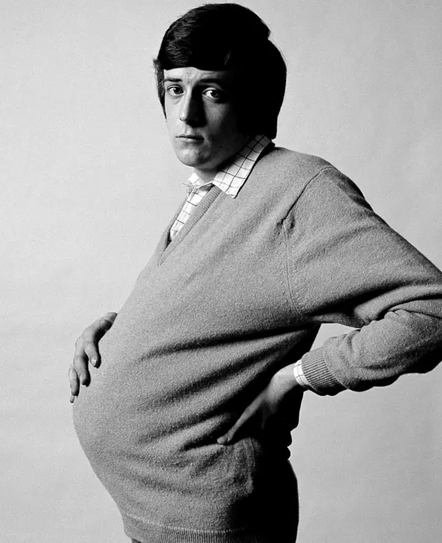 Foto of man wey get bele wey dem use for advert to encourage di use of contraceptive. Alan Brooking snap dis one for 1970 (The Pregnant Man).