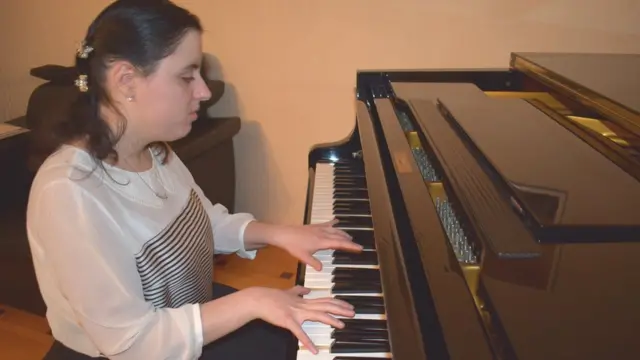 Маико Куция