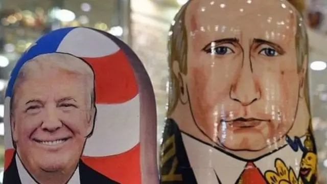 डोनल्ड ट्रंप और व्लादिमीर पुतिन के मुखौटे