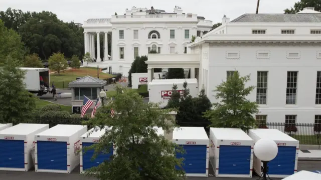West Executive Drive outside the West Wing shown filled with large containers during the refurbishments.