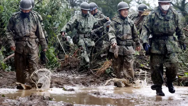 Japanese Self-Defence Force soldiers conduct search and rescue operation at a landslide site caused by Typhoon Nanmadol in Mimata Town, Miyazaki Prefecture on Japan's southernmost main island of Kyushu September 19, 2022,