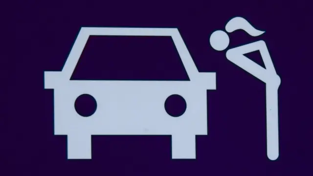 Sign wey dem put for road di day goment open di sex booths