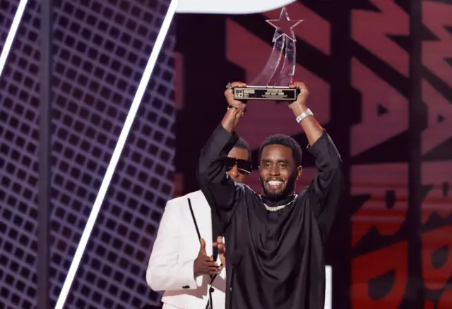 Sean 'Diddy' Combs accept di Lifetime Achievement Award onstage during di 2022 BET Awards