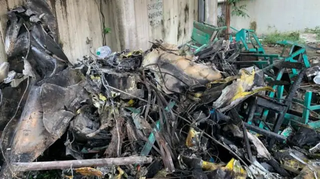 বিধ্বস্ত হওয়ার পর ছিন্নভিন্ন হওয়া প্রশিক্ষণ বিমানের অংশবিশেষ