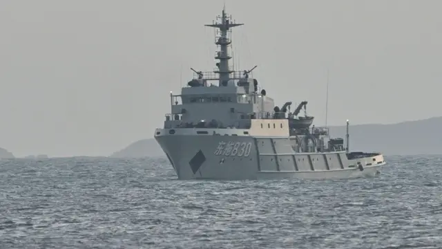 A Chinese ship is seen in waters near Pingtan island, the closest point to Taiwan, in eastern China's Fujian province on December 29, 2025.
