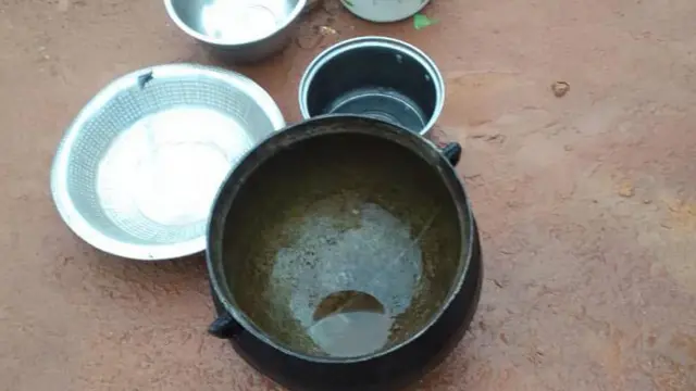 Pot and plates wey di family use take chop di food
