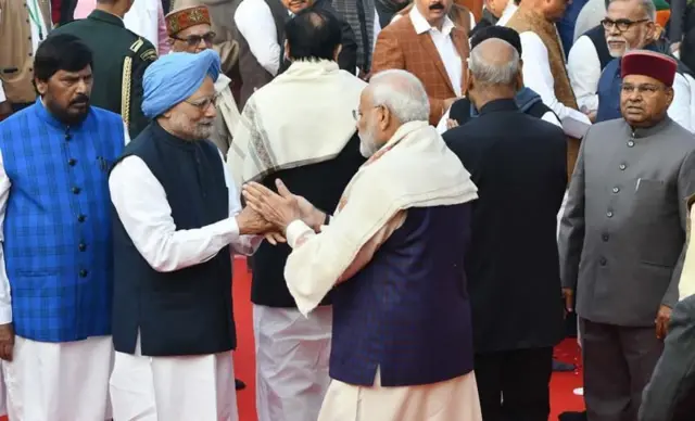 मनमोहन सिंह और पीएम मोदी