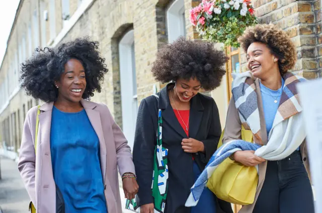 Three ladies walking together