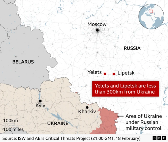 A map showing parts of Russia, Ukraine, and Belarus. Moscow is marked in the north, with Yelets and Lipetsk highlighted south of it. A red label notes that Yelets and Lipetsk are less than 300km from Ukraine. The map also shows Kyiv and Kharkiv in Ukraine, with an area in eastern Ukraine shaded to indicate territory under Russian military control. A small inset globe highlights the region’s location.