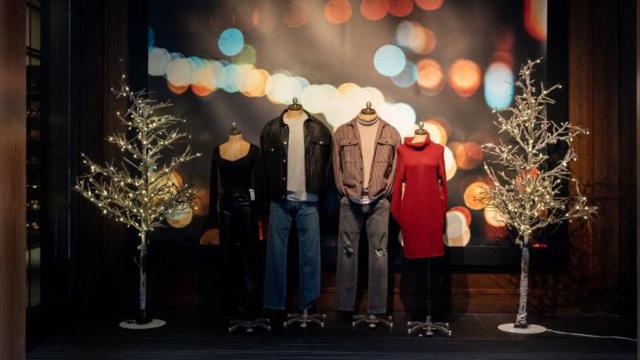 The inside display at Abercrombie & Fitch on 5th avenue in New York, NY on Nov. 20, 2021, showing a red sweater dress and other clothing