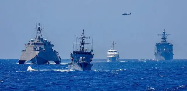 море