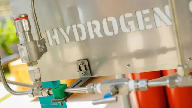 A tank with hydrogen written on the side