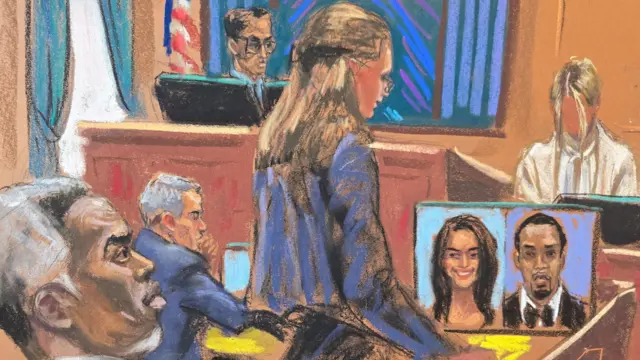 Комбс слухає, як прокурор допитує Мію у справі про торгівлю людьми 