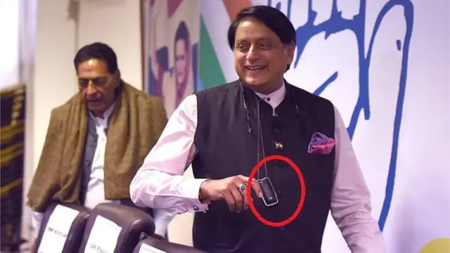 శశిథరూర్ మెడలో పర్సనల్ ఎయిర్ ప్యూరిఫయర్