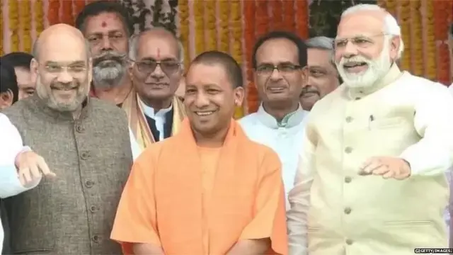 નરેન્દ્ર મોદી, યોગી આદિત્ય નાથ અને અમિત શાહ