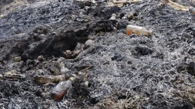 नष्ट गरिएको रक्सीका बोतल