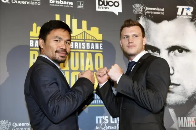 Jeff Horn (R) of Australia and Manny Pacquiao (L) of the Philippines pose for photographs following a press conference in Brisbane, Queensland, Australia.