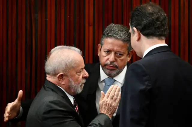 Lula com Arthur Lira (ao centro) e Rodrigo Pacheco (de costas) durantebetspeed quem é o donocerimôniabetspeed quem é o donodiplomação como presidente pelo TSEbetspeed quem é o donodezembrobetspeed quem é o dono2022