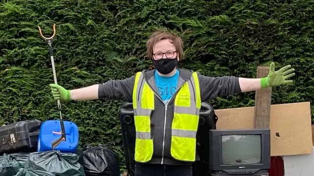 Chris for one of im videos where e dey pick up litter