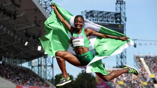 Tobi Amusan of Team Nigeria celebrate afta winning di gold medal in the Women's 100m Hurdles Final on day ten of di Birmingham 2022 Commonwealth Games