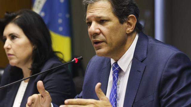 A ministra do Orçamento e Planejamento, Simone Tebet, e o ministro da fazenda, Fernando Haddad