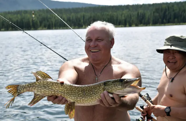 TYVA REPUBLIC, RUSSIA - AUGUST 5, 2017: Viktor Zimin (L), head of the Republic of Khakassia, and Sholban Kara-ool, head of the Republic of Tyva, fishing. Alexei Nikolsky/Russian Presidential Press and Information Office/TASS (Photo by Alexei Nikolsky\TASS via Getty Images)