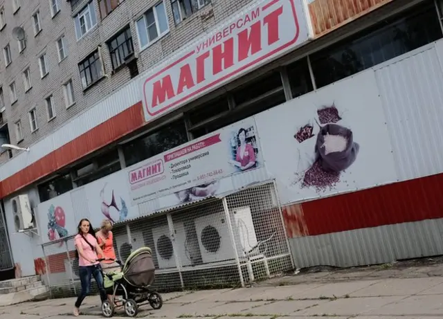 Женщина с коляской