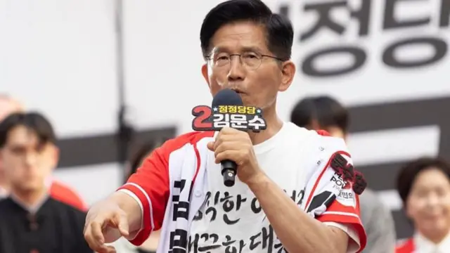 Проигравший кандидат Ким Мун Су 