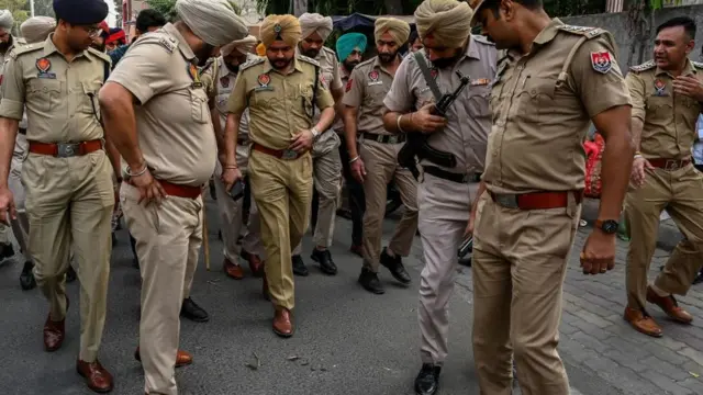 Police inspect the site where Shiv Sena leader Sudhir Suri was shot dead while he was protesting in front of a temple by an unidentified assailant in Amritsar on November 4, 2022.