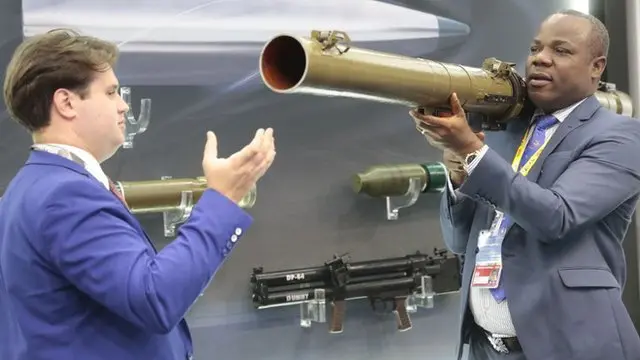 African delegate carri rocket launcher to test