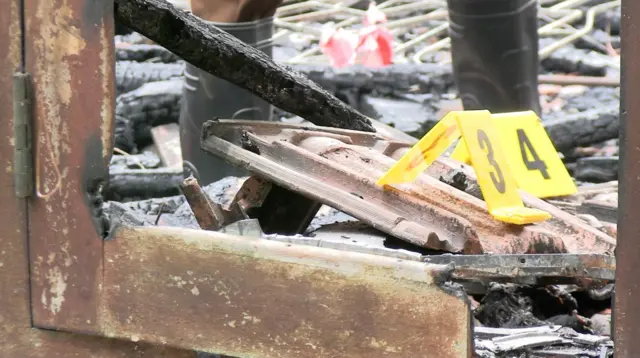 ගිනි ගන්නා ලද ස්ථානයේ දර්ශනයක් 