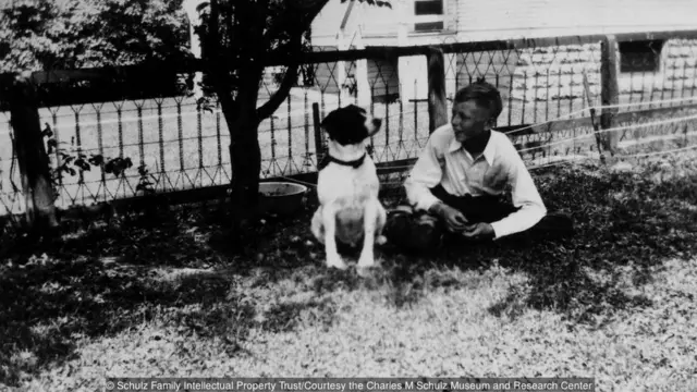 Charles Schulz dan anjingnya Spike pada 1935, saat Schulz berusia 13 tahun.