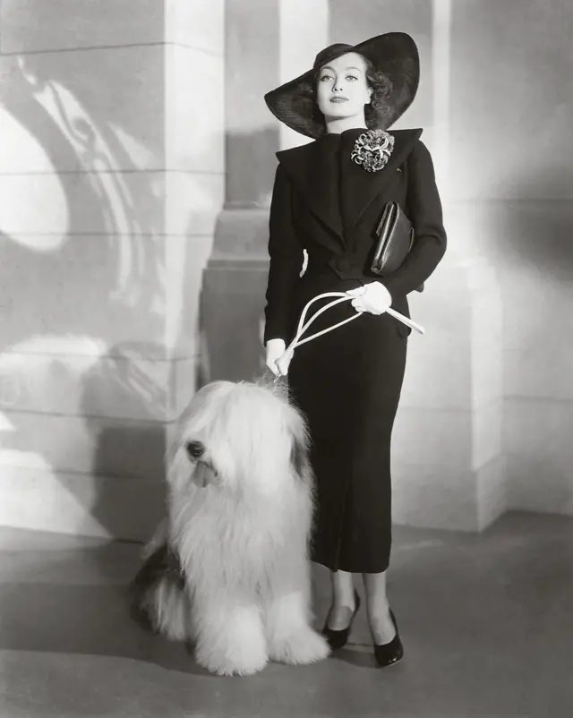 Джоан Кроуфорд з брошкою від Haskell