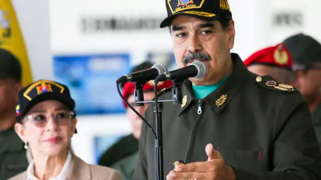 Николас Мадуро и его жена во время недавнего публичного мероприятия