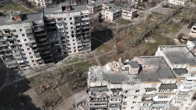 A view of destroyed buildings in Vuhledar on 26 March 2023